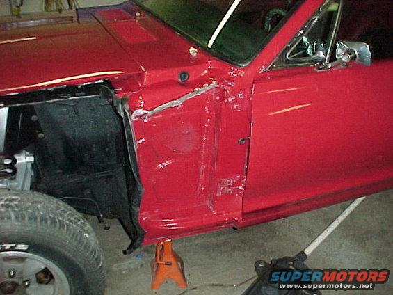 mvc009f.jpg I resealed all the body joints after paint. This shows the cowl sealant. 