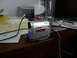 1996 Ford Probe - A silver Sony Handycam camcorder sits on a wooden desk next to papers and a printer.