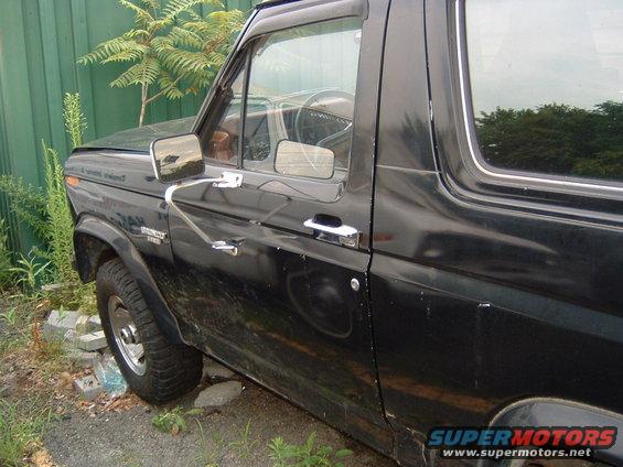 Black 1980s Ford Bronco side view
