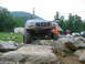 1992 Ford Mustang - Ford F-Series truck tackling a challenging rock crawling course.