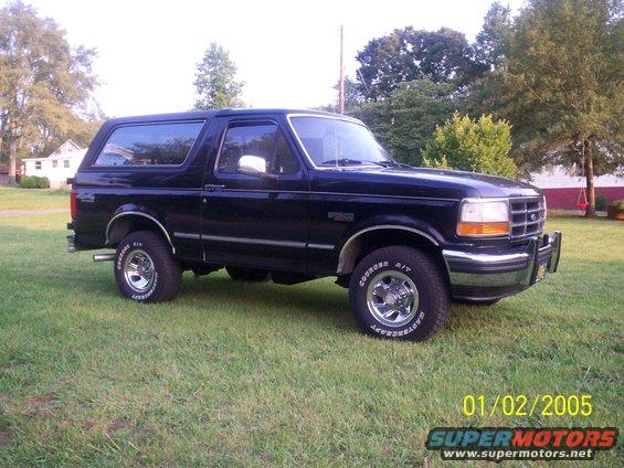 Black 1993 Ford Bronco parked on grass