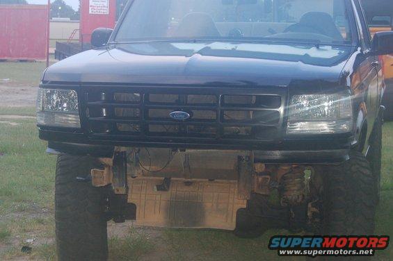 Black Ford Bronco front view, missing bumper, lifted suspension