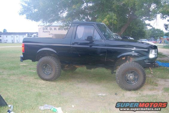 Black lifted 1995 Ford Bronco side view