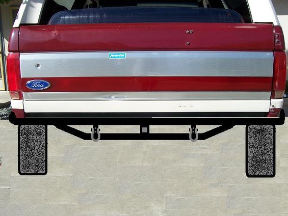Rear view of a Ford Bronco tailgate with a custom rear bumper and trailer hitch installed
