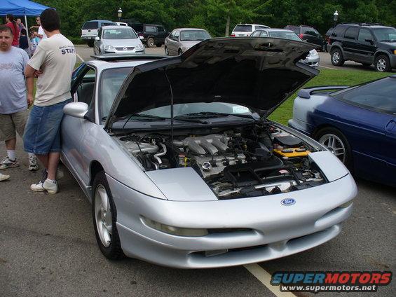 Silver 1991 Ford Probe front view with hood open