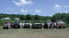 1985 GMC Jimmy - Several off-road vehicles and their owners gathered outdoors on a sunny day.