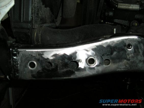 p7310009.jpg located holes 1.5 forward of the stock holes and installed sleeves for the bolts