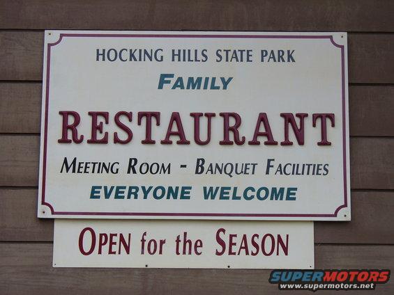 Sign for Hocking Hills State Park Family Restaurant, with text about meeting room, banquet facilities, and being open for the season