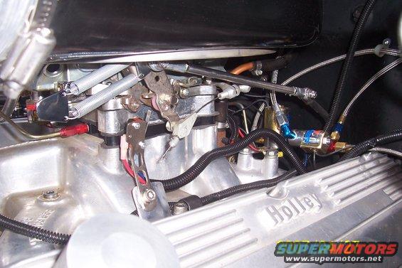 throttle.jpg Custom throttle linkage with heim joints, threaded rod and stainless sleeve.