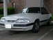 1991 Ford Mustang - Front view of a white 1991 Ford Mustang coupe parked outdoors.