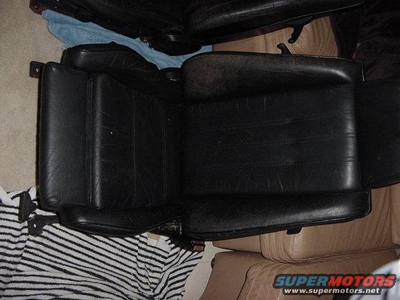 Black leather car seats stacked on top of each other