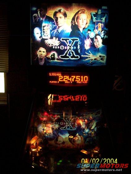 X-Files pinball machine with digital score display