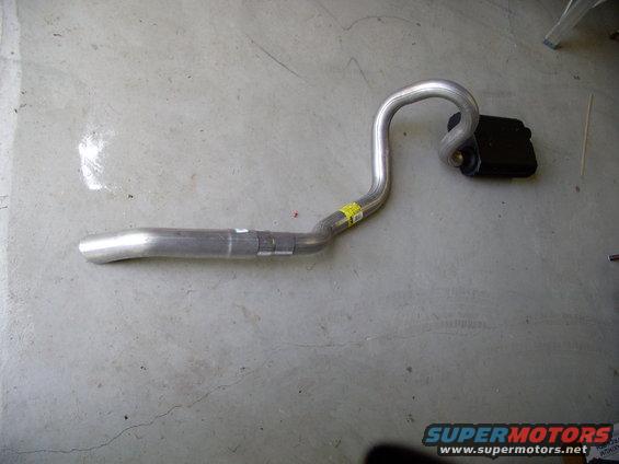img_0039.jpg It's truly amazing how well this Impala SS tailpipe makes all the right turns and bends for our panthers. The real beauty is the mandrel bends on 2 1/2" pipe, not 2 1/4" Chev piping or 2" (1 7/8"?) Lincoln piping.