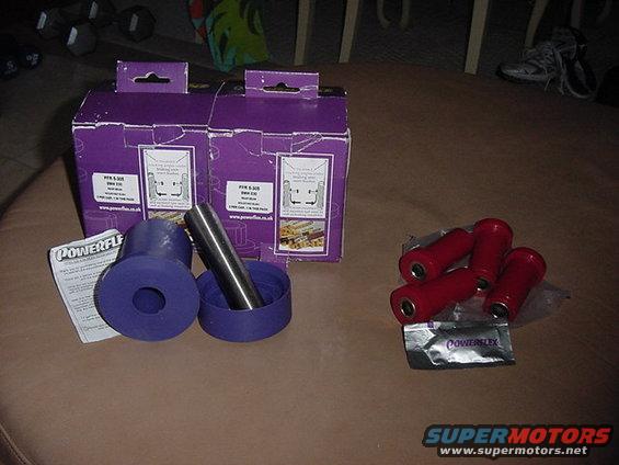 Purple and red Powerflex suspension bushings with packaging