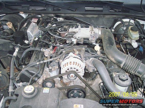 Engine bay with visible V8 engine components and date stamp 2007/08/05