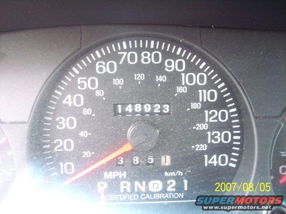 Car dashboard showing speedometer, odometer reading 148923, and date 2007/08/05