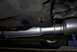 1994 Dodge Stealth - Close-up view of a vehicle's undercarriage, focusing on the newly installed exhaust system components.