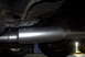 1994 Dodge Stealth - The underside of a vehicle shows a newly installed exhaust system, including the muffler and piping.