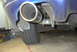 1994 Dodge Stealth - Rear view of a vehicle's exhaust system and tire.