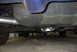 1994 Dodge Stealth - The undercarriage of a vehicle is shown, focusing on the fuel tank and a dual exhaust system.