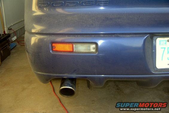 1994 Dodge Stealth rear bumper with exhaust pipe and amber/clear lights