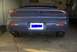 1994 Dodge Stealth - The rear of a blue 1994 Dodge Stealth is shown, its dual exhaust pipes and taillights.