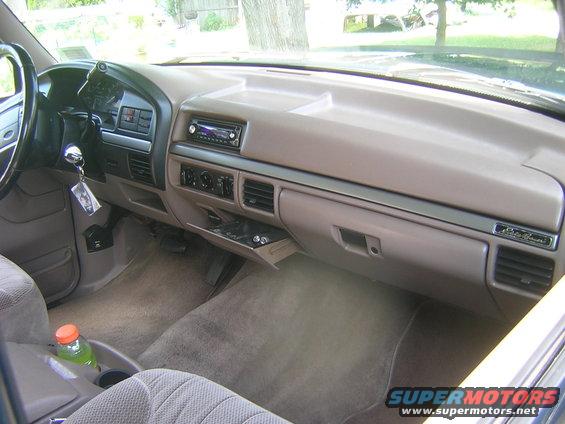 1994 Ford Bronco interior showing dashboard, steering wheel, and passenger side