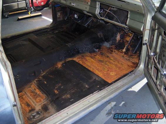 100_1428.jpg just alittle surface rust on this side from the heater core that leaked for like 6 monthes when I first got this Ranchero in 2002