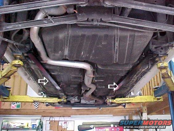 Undercarriage view showing exhaust system and suspension components