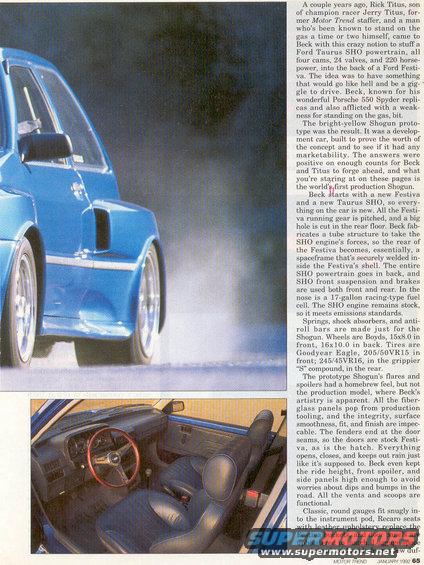 Blue custom car exterior and racing interior with bucket seats and aftermarket steering wheel