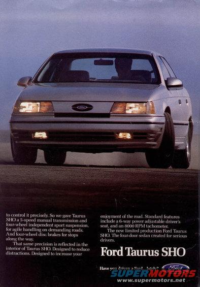 1993 Ford Taurus SHO driving on a dirt road, front view
