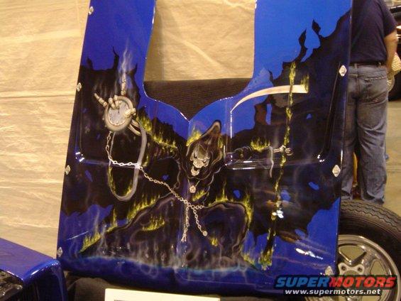 Blue hood with grim reaper airbrush art and a clock