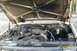 1985 Ford Bronco - Engine bay of a 1985 Ford Bronco, showing the engine and surrounding components.