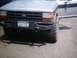 1990 Ford Ranger - The front grille and custom bumper of a 1990 Ford Ranger are visible, along with a New York license plate.