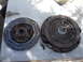 1992 Ford Taurus - Clutch disc and pressure plate, automotive parts, likely for manual transmission.
