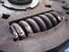 1992 Ford Taurus - A close-up view of the springs within a clutch pressure plate, revealing signs of wear and corrosion.
