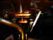 1992 Ford Taurus - Close-up of an engine oil dipstick, indicating the oil level within the engine.
