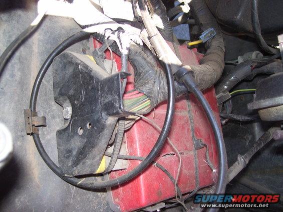 Engine compartment wiring and red box with Supermotors.net logo
