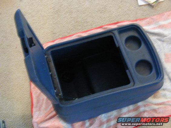 Blue center console with open lid and two cup holders