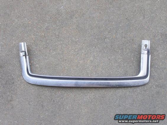 Chrome trim piece with black insert, likely for a vehicle