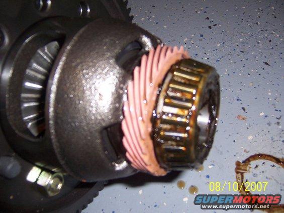 Speedometer gear held in place with bearing.  File chamfer on internal diameter of gear that faces the center of the LSD.  This would be the far side in this pic.