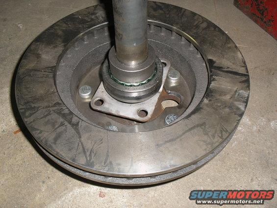 Brake rotor and hub assembly with visible grease and bolts
