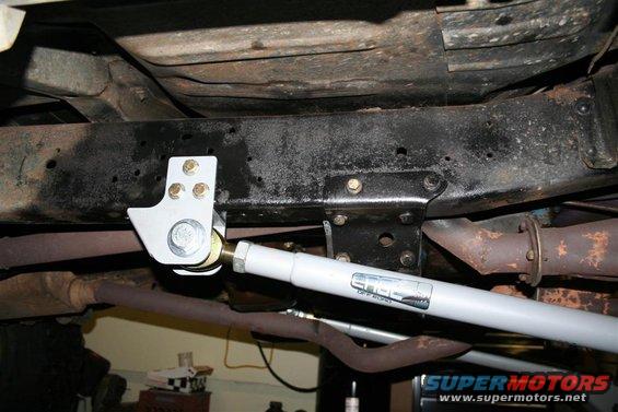 White suspension component with 'EDGE OFF-ROAD' logo attached to vehicle frame