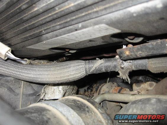 Damaged wiring harness in engine bay