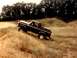 1979 Ford Bronco - This 1978 Ford Bronco is shown navigating a sandy terrain.
