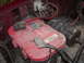 1991 Ford Bronco - The engine bay shows a red Optima battery and associated electrical components.