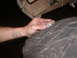 1991 Ford Bronco - Checking tire tread depth with a coin.