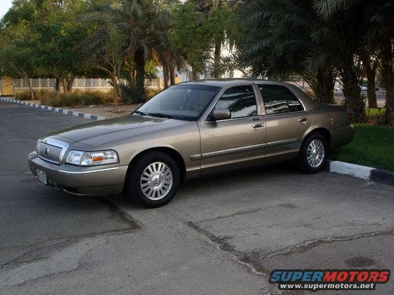 Tan 2007 Mercury Grand Marquis sedan, 3q front view