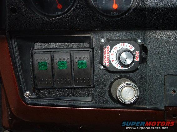 leftswitches.jpg 3 Contura switches and MSD Timing Control Unit.
This gauge cover is a template as it is a old broken one....
but I think they still came out ok..
