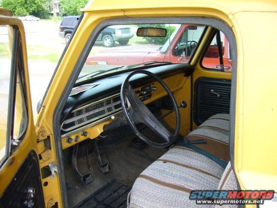 view from the driver's door, check out that perfect dash cap, original AM radio, and 4-speed floorshift!